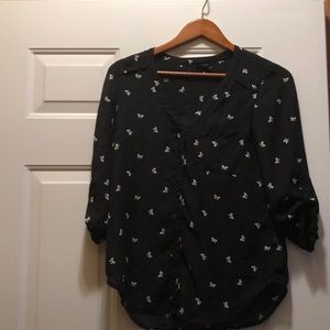 Maurice’s black white patterned bow blouse